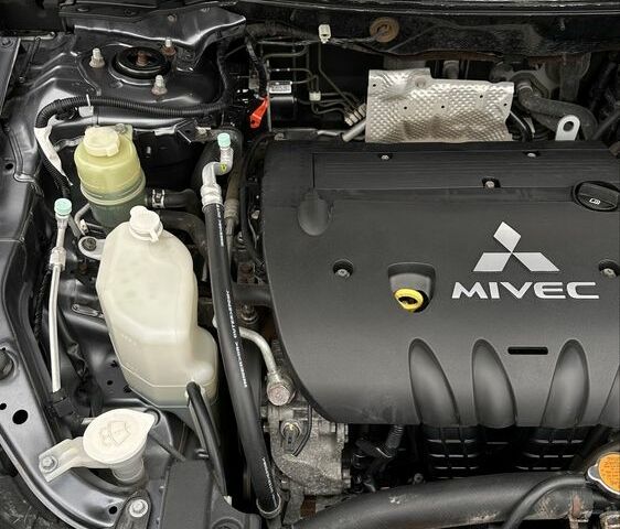 Серый Мицубиси Лансер, объемом двигателя 2 л и пробегом 145 тыс. км за 8299 $, фото 7 на Automoto.ua