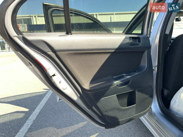 Сірий Міцубісі Lancer, об'ємом двигуна 2 л та пробігом 237 тис. км за 7200 $, фото 36 на Automoto.ua