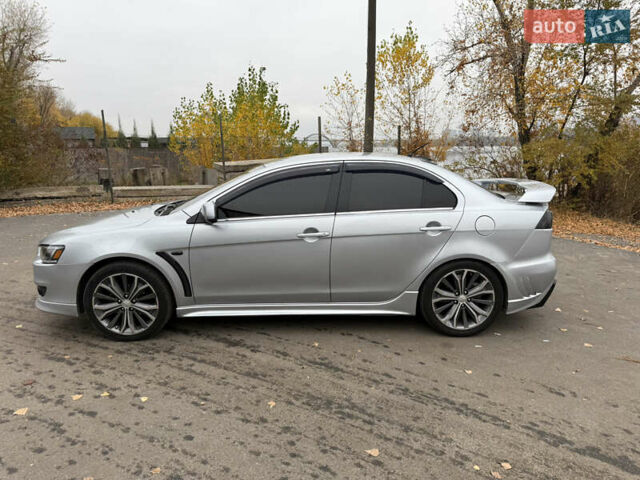 Сірий Міцубісі Lancer, об'ємом двигуна 2 л та пробігом 253 тис. км за 8700 $, фото 10 на Automoto.ua