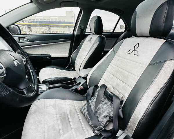 Сірий Міцубісі Lancer, об'ємом двигуна 2 л та пробігом 238 тис. км за 5350 $, фото 10 на Automoto.ua