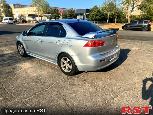 Серый Мицубиси Лансер, объемом двигателя 2 л и пробегом 151 тыс. км за 6099 $, фото 4 на Automoto.ua