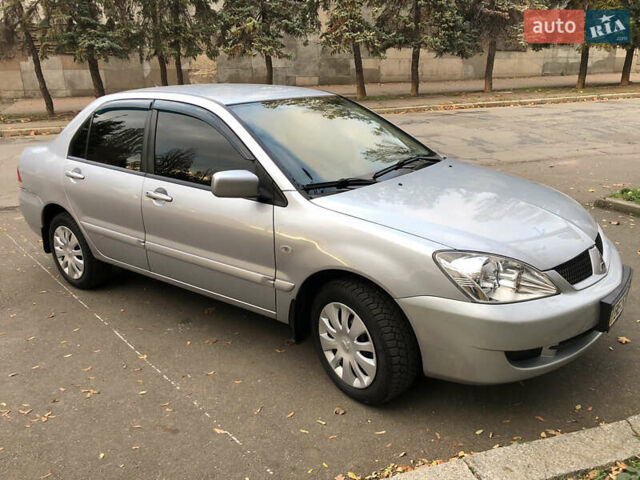 Мицубиси Лансер 2008 в Николаеве на Automoto.ua Серый Мицубиси Лансер, объемом двигателя 1.58 л и пробегом 132 тыс. км за 5900 $, фото 15 на Automoto.ua