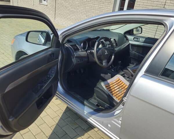 Серый Мицубиси Лансер, объемом двигателя 1.5 л и пробегом 219 тыс. км за 4700 $, фото 10 на Automoto.ua