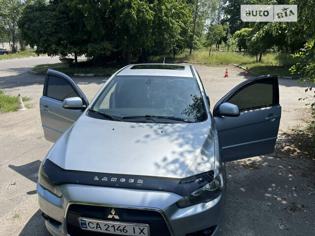 Сірий Міцубісі Lancer, об'ємом двигуна 2 л та пробігом 306 тис. км за 6300 $, фото 20 на Automoto.ua