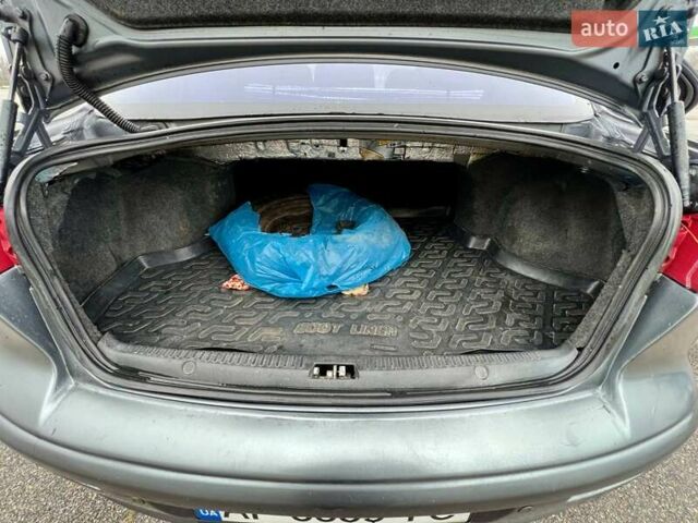 Серый Мицубиси Лансер, объемом двигателя 2 л и пробегом 203 тыс. км за 4999 $, фото 18 на Automoto.ua