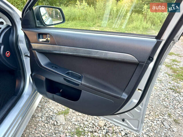 Сірий Міцубісі Lancer, об'ємом двигуна 2 л та пробігом 223 тис. км за 7390 $, фото 19 на Automoto.ua
