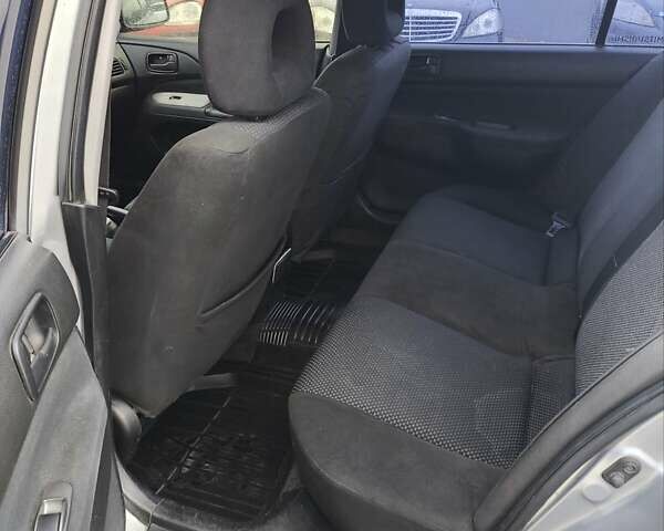 Сірий Міцубісі Lancer, об'ємом двигуна 1.6 л та пробігом 240 тис. км за 2999 $, фото 10 на Automoto.ua