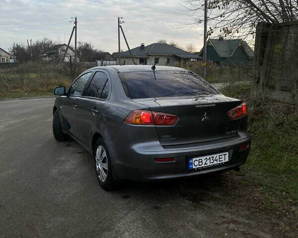 Серый Мицубиси Лансер, объемом двигателя 1.5 л и пробегом 255 тыс. км за 6500 $, фото 4 на Automoto.ua