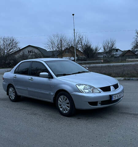 Сірий Міцубісі Lancer, об'ємом двигуна 1.58 л та пробігом 180 тис. км за 3900 $, фото 2 на Automoto.ua