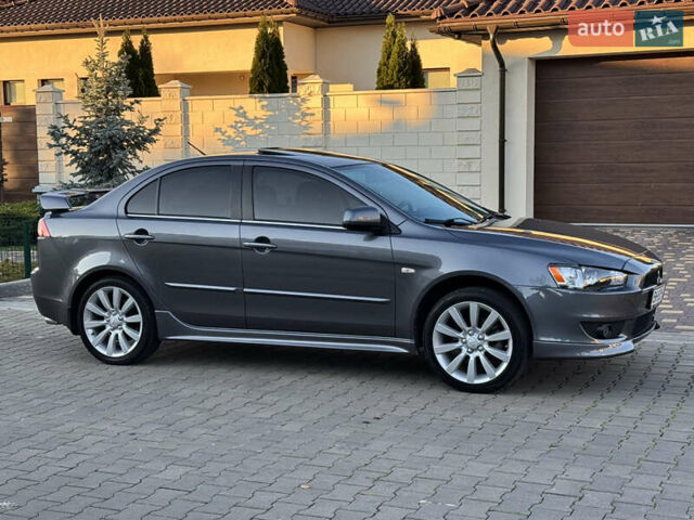 Сірий Міцубісі Lancer, об'ємом двигуна 2 л та пробігом 92 тис. км за 9800 $, фото 59 на Automoto.ua