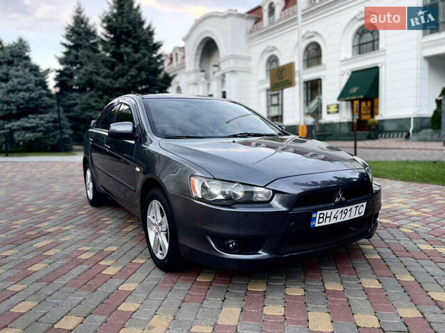 Серый Мицубиси Лансер, объемом двигателя 2 л и пробегом 212 тыс. км за 6000 $, фото 17 на Automoto.ua