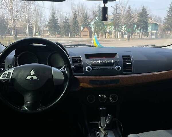 Сірий Міцубісі Lancer, об'ємом двигуна 1.47 л та пробігом 134 тис. км за 7200 $, фото 17 на Automoto.ua