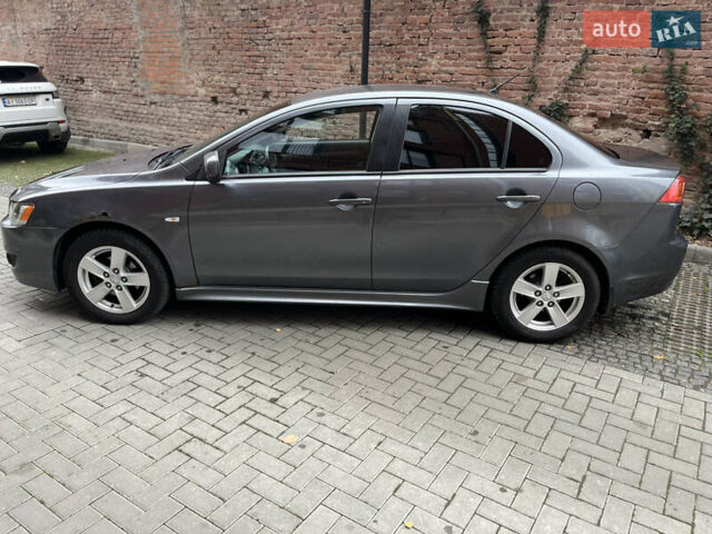 Сірий Міцубісі Lancer, об'ємом двигуна 2 л та пробігом 131 тис. км за 4899 $, фото 3 на Automoto.ua