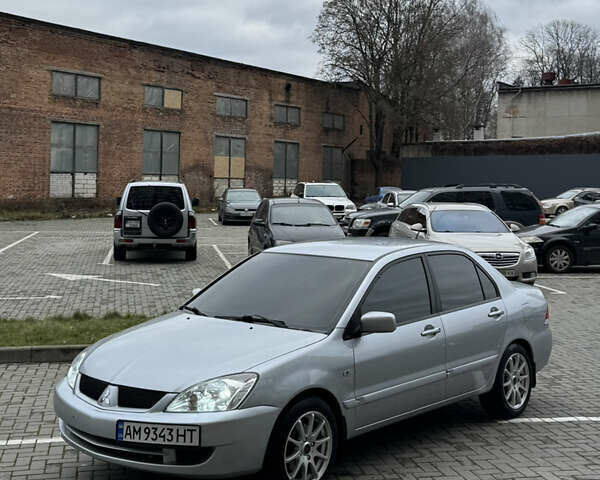 Сірий Міцубісі Lancer, об'ємом двигуна 1.6 л та пробігом 269 тис. км за 3999 $, фото 6 на Automoto.ua