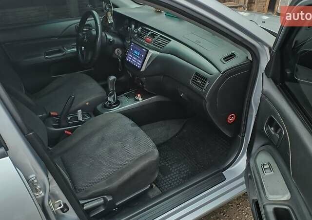 Серый Мицубиси Лансер, объемом двигателя 1.6 л и пробегом 320 тыс. км за 4167 $, фото 5 на Automoto.ua