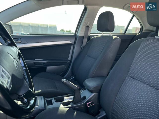 Сірий Міцубісі Lancer, об'ємом двигуна 2 л та пробігом 237 тис. км за 7200 $, фото 42 на Automoto.ua