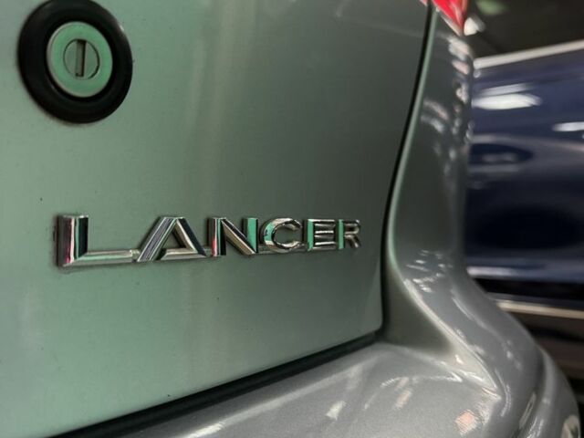 Серый Мицубиси Лансер, объемом двигателя 2 л и пробегом 172 тыс. км за 6300 $, фото 5 на Automoto.ua