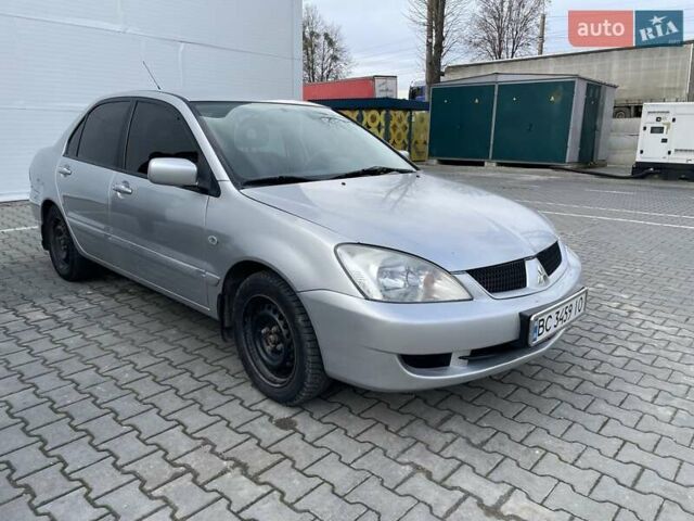 Сірий Міцубісі Lancer, об'ємом двигуна 1.6 л та пробігом 260 тис. км за 4200 $, фото 1 на Automoto.ua