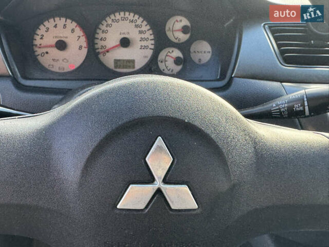 Мицубиси Лансер 2008 в Одессе на Automoto.ua Серый Мицубиси Лансер, объемом двигателя 1.6 л и пробегом 221 тыс. км за 3700 $, фото 17 на Automoto.ua