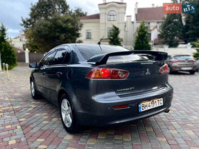 Серый Мицубиси Лансер, объемом двигателя 2 л и пробегом 212 тыс. км за 6000 $, фото 19 на Automoto.ua