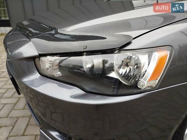 Міцубісі Lancer 2008 у Хмельницькому на Automoto.ua Сірий Міцубісі Lancer, об'ємом двигуна 2 л та пробігом 157 тис. км за 6300 $, фото 12 на Automoto.ua