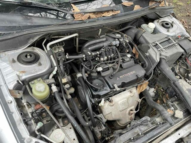 Серый Мицубиси Лансер, объемом двигателя 1.6 л и пробегом 280 тыс. км за 900 $, фото 7 на Automoto.ua