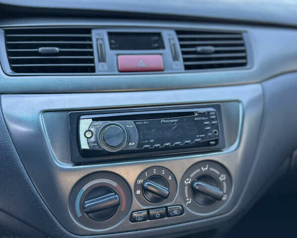 Сірий Міцубісі Lancer, об'ємом двигуна 1.6 л та пробігом 278 тис. км за 3999 $, фото 8 на Automoto.ua