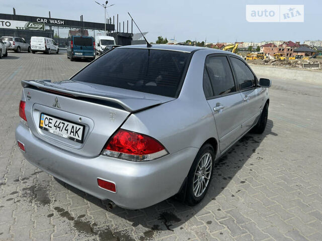 Сірий Міцубісі Lancer, об'ємом двигуна 1.6 л та пробігом 150 тис. км за 4999 $, фото 4 на Automoto.ua