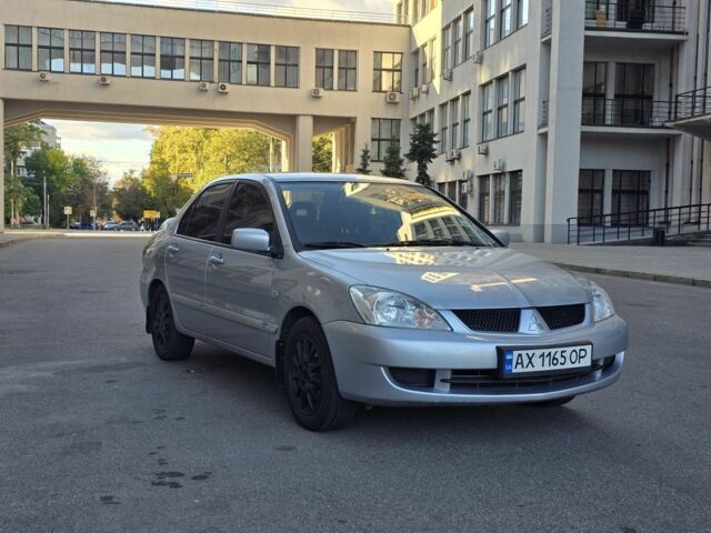 Серый Мицубиси Лансер, объемом двигателя 1.6 л и пробегом 150 тыс. км за 4700 $, фото 1 на Automoto.ua