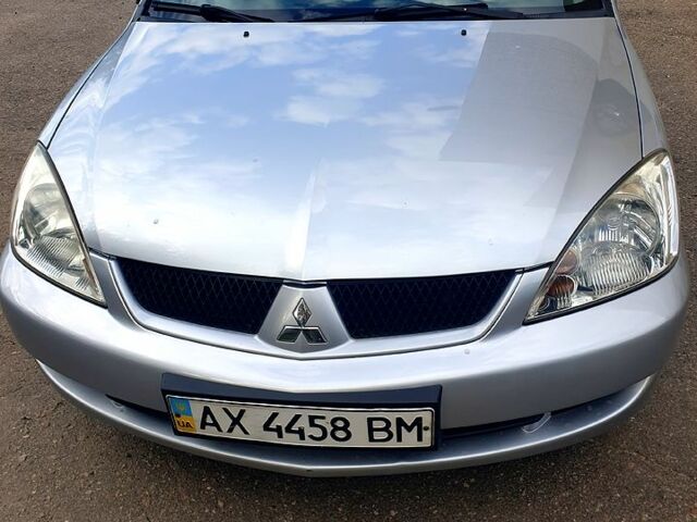 Серый Мицубиси Лансер, объемом двигателя 1.6 л и пробегом 98 тыс. км за 6200 $, фото 3 на Automoto.ua