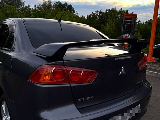 Сірий Міцубісі Lancer, об'ємом двигуна 2 л та пробігом 180 тис. км за 7600 $, фото 4 на Automoto.ua