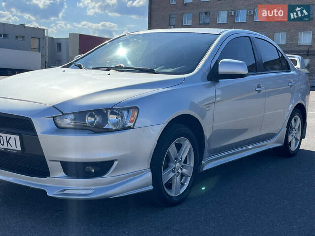 Сірий Міцубісі Lancer, об'ємом двигуна 2 л та пробігом 237 тис. км за 7200 $, фото 10 на Automoto.ua