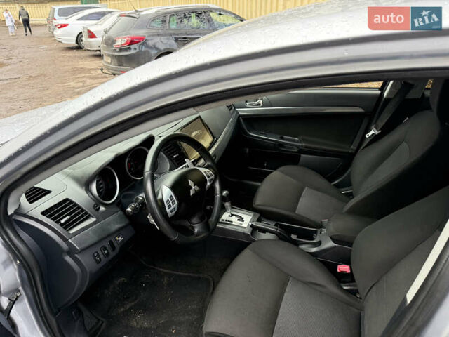 Серый Мицубиси Лансер, объемом двигателя 2 л и пробегом 265 тыс. км за 5200 $, фото 9 на Automoto.ua