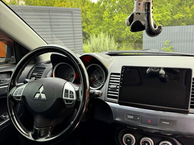 Сірий Міцубісі Lancer, об'ємом двигуна 2 л та пробігом 180 тис. км за 7600 $, фото 7 на Automoto.ua