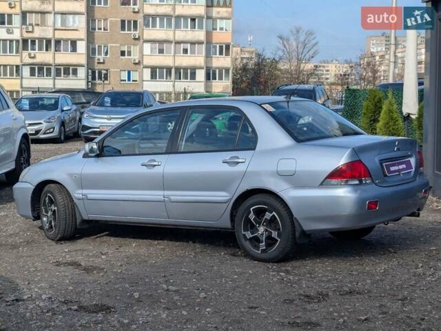 Серый Мицубиси Лансер, объемом двигателя 1.6 л и пробегом 155 тыс. км за 5200 $, фото 11 на Automoto.ua
