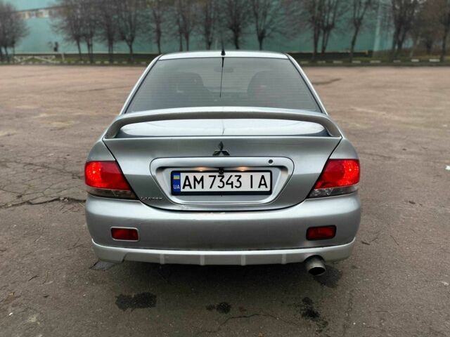 Сірий Міцубісі Lancer, об'ємом двигуна 1.6 л та пробігом 254 тис. км за 3800 $, фото 5 на Automoto.ua