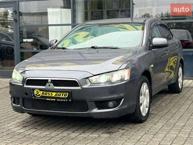 Серый Мицубиси Лансер, объемом двигателя 1.5 л и пробегом 239 тыс. км за 6000 $, фото 2 на Automoto.ua