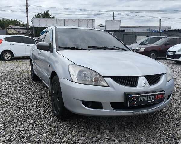 Сірий Міцубісі Lancer, об'ємом двигуна 1.6 л та пробігом 240 тис. км за 2999 $, фото 5 на Automoto.ua