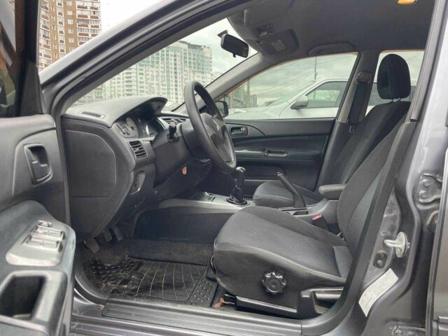 Серый Мицубиси Лансер, объемом двигателя 1.6 л и пробегом 146 тыс. км за 5990 $, фото 7 на Automoto.ua