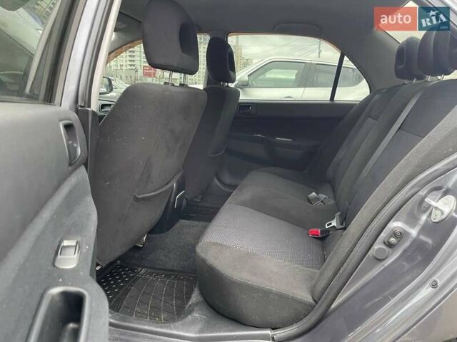 Серый Мицубиси Лансер, объемом двигателя 1.58 л и пробегом 146 тыс. км за 5490 $, фото 9 на Automoto.ua