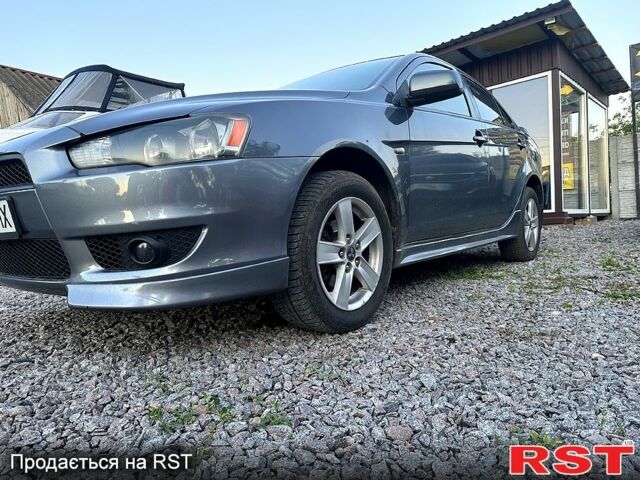 Сірий Міцубісі Lancer, об'ємом двигуна 2 л та пробігом 208 тис. км за 5899 $, фото 6 на Automoto.ua