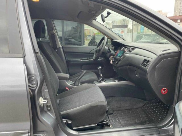 Серый Мицубиси Лансер, объемом двигателя 1.6 л и пробегом 146 тыс. км за 5990 $, фото 10 на Automoto.ua