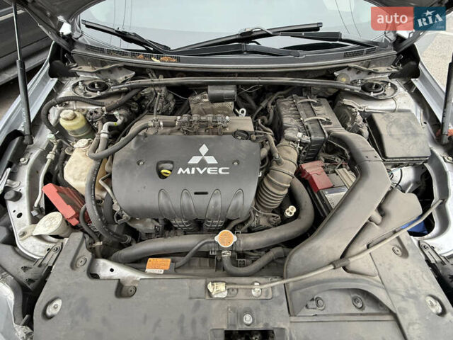 Сірий Міцубісі Lancer, об'ємом двигуна 2 л та пробігом 253 тис. км за 8700 $, фото 49 на Automoto.ua