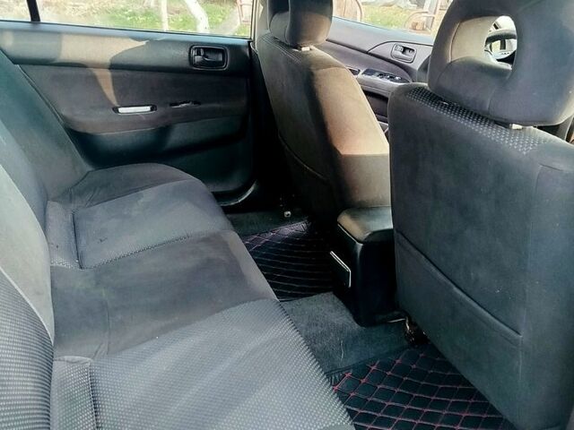 Сірий Міцубісі Lancer, об'ємом двигуна 1.6 л та пробігом 250 тис. км за 3500 $, фото 4 на Automoto.ua
