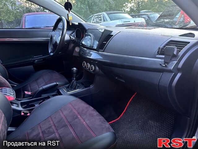 Сірий Міцубісі Lancer, об'ємом двигуна 2 л та пробігом 208 тис. км за 5899 $, фото 9 на Automoto.ua
