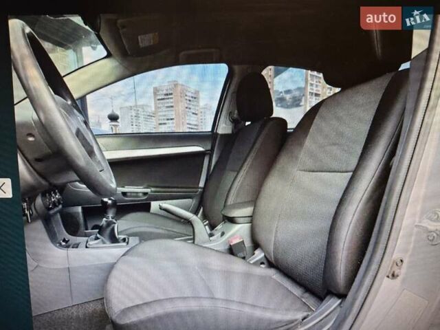 Сірий Міцубісі Lancer, об'ємом двигуна 1.5 л та пробігом 235 тис. км за 6500 $, фото 20 на Automoto.ua