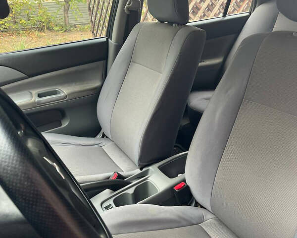 Мицубиси Лансер 2008 в Днепре (Днепропетровске) на Automoto.ua Серый Мицубиси Лансер, объемом двигателя 1.3 л и пробегом 220 тыс. км за 6000 $, фото 8 на Automoto.ua