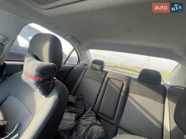 Сірий Міцубісі Lancer, об'ємом двигуна 2 л та пробігом 92 тис. км за 7700 $, фото 2 на Automoto.ua