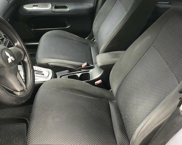 Сірий Міцубісі Lancer, об'ємом двигуна 1.58 л та пробігом 240 тис. км за 4299 $, фото 16 на Automoto.ua