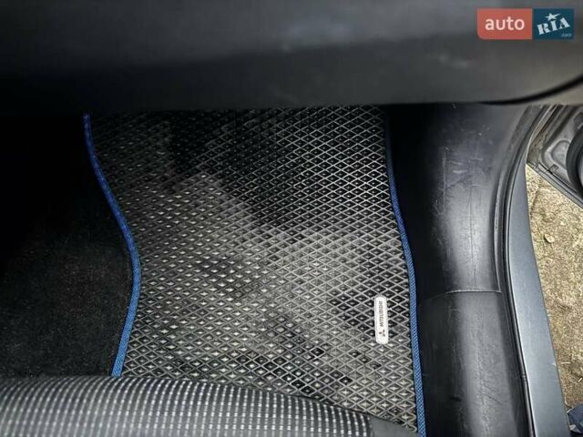 Серый Мицубиси Лансер, объемом двигателя 1.5 л и пробегом 147 тыс. км за 6700 $, фото 12 на Automoto.ua